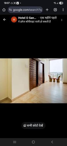 a picture of a room with a bench and a table at Hotel The Sangat Prime 