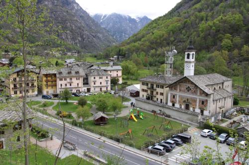 an aerial view of a town in the mountains at Anita Haus - Issime in Issime