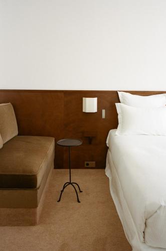 Hôtel Masséにあるベッド