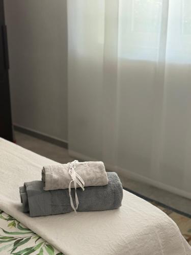 Ένα ή περισσότερα κρεβάτια σε δωμάτιο στο Casa Simonetta
