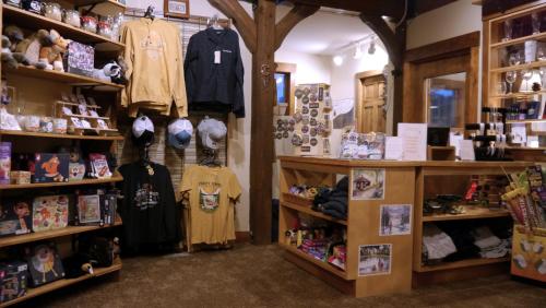 a store with a bunch of clothes on shelves at Purity Spring Resort in Madison