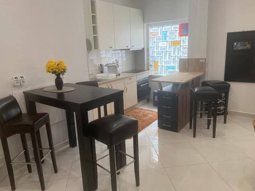 Η κουζίνα ή μικρή κουζίνα στο Seven‘S Apartments I