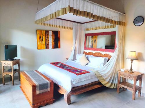 Katil atau katil-katil dalam bilik di Villa Nirvana