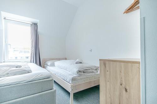 Una cama o camas en una habitación de Hotel Astral Vienna