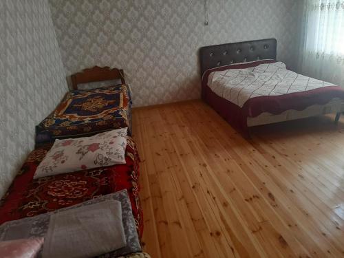 Llit o llits en una habitació de Ibo Rent