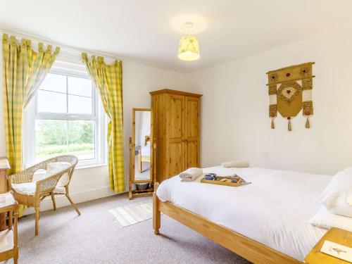 Ένα ή περισσότερα κρεβάτια σε δωμάτιο στο 3 Bed in Thornham KT022