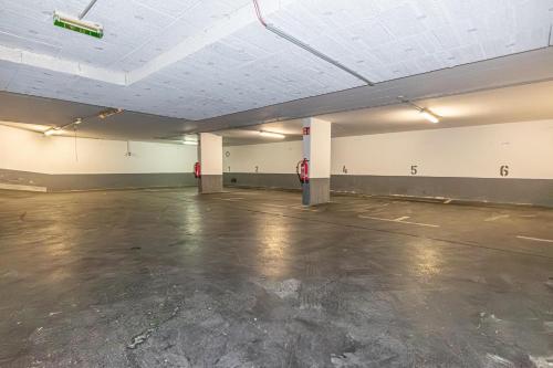 an empty room with an empty parking lot at Hotel Astral Vienna in Vienna