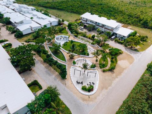 an aerial view of a house with a driveway and trees at Rio Minho Oasis in Dambani