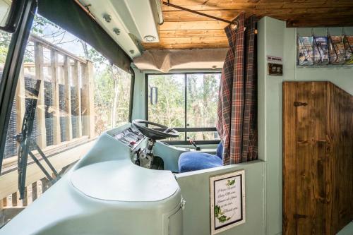 a bathroom with a sink and a tub in a house at The Bus Stop, Thornham Magna in Thornham Magna
