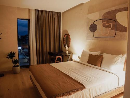 Katil atau katil-katil dalam bilik di Zyra boutique hotel