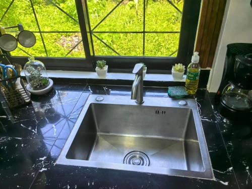 Φωτογραφία από το άλμπουμ του Tiny House Loft Style σε Digos