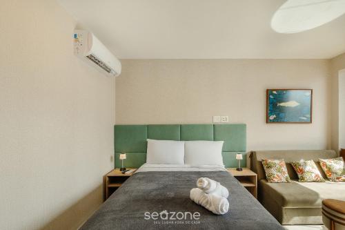 Katil atau katil-katil dalam bilik di Acomode-se com estilo e praticidade em Salvador – LIV