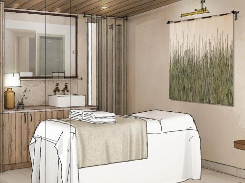 a bathroom with two beds and a sink at Woolley Grange Hotel in Bradford on Avon