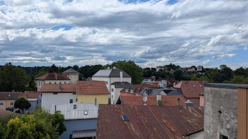 a view of a city with houses and roofs at Ferienwohnung Salzachstadt in Laufen