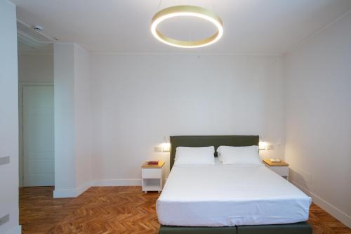 Кровать или кровати в номере Villa Maria Teresa Boutique Hotel