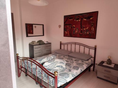 Ένα ή περισσότερα κρεβάτια σε δωμάτιο στο Casa Ikigai - accogliente e spaziosa