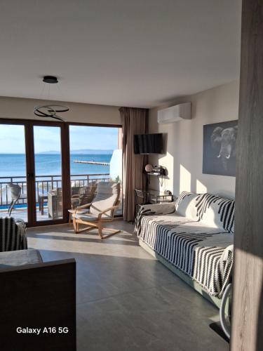 Postel nebo postele na pokoji v ubytování SeaShore Residence A