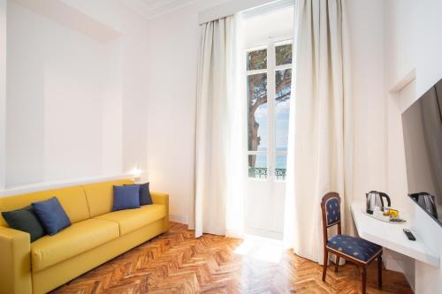 Телевизор и/или развлекательный центр в Villa Maria Teresa Boutique Hotel