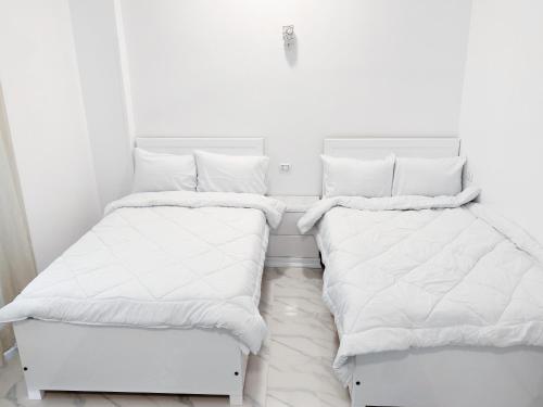 Postel nebo postele na pokoji v ubytování star- guest house