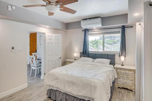 a bedroom with a bed and a window at The Surf Retreat in Conejo Valley Trailer Park