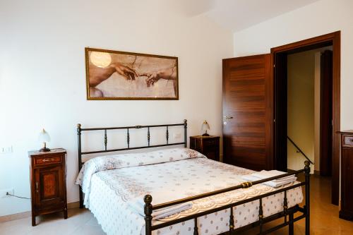Postel nebo postele na pokoji v ubytování Borgo Tarapino