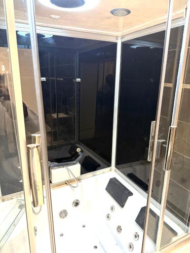 a view of the inside of a shower in a boat at استديو Zara in Taif
