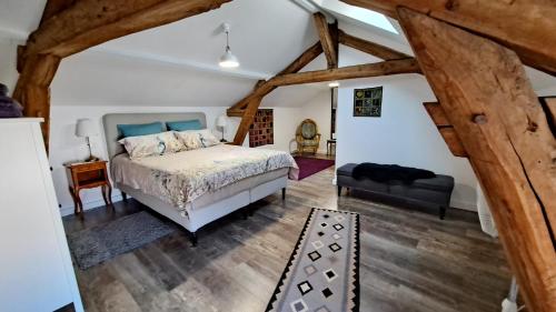 Postel nebo postele na pokoji v ubytování Gîtes Angulus Ridet