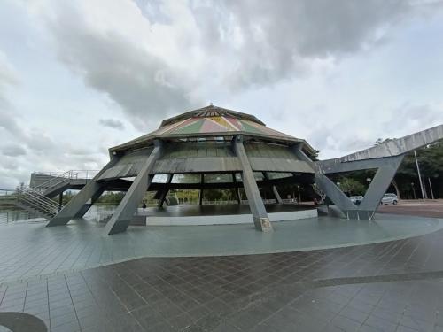 a pavilion with a roof on a tiled floor at HmHome-five in Sibu