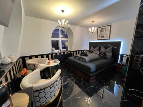a living room with a couch and a table at Nero Due in Meckenbeuren
