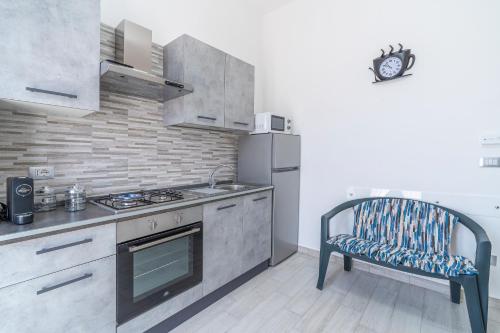 Kuchyň nebo kuchyňský kout v ubytování Le Quattro Perle Apartments