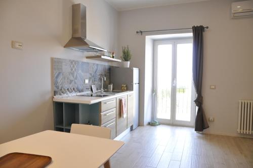 a kitchen with a sink and a counter top at Anaka sweet home in Agrigento