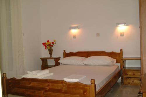 Ένα ή περισσότερα κρεβάτια σε δωμάτιο στο Steve Apartments