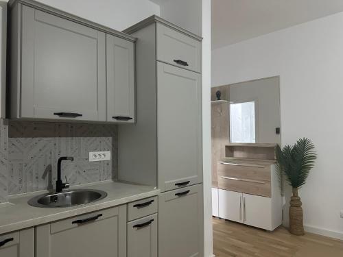 Kuchyň nebo kuchyňský kout v ubytování Apartment Lule