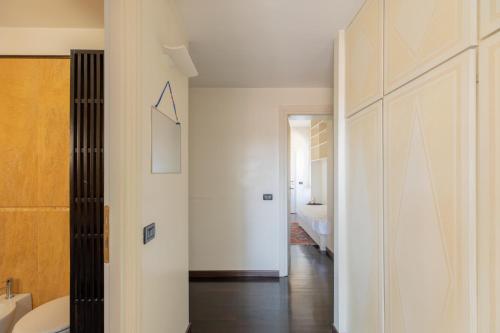 a bathroom with a sink and a toilet in a room at Celeste Retreat al Pantheon - Homkeey Apartments in Rome