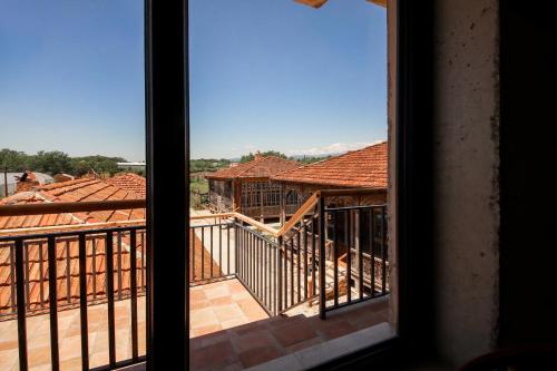 a view from a window of a house at Kera Ethno Hotel in Gvishtibi