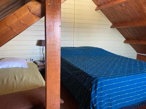 Les Bungalows les Vanilliers, Sud Sauvage avec piscineにあるベッド