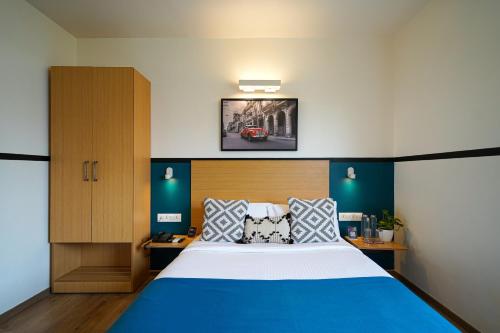 Olive Hotel Indiranagar by Embassy Groupにあるベッド