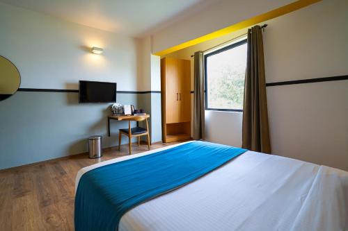 Olive Hotel Indiranagar by Embassy Groupにあるベッド