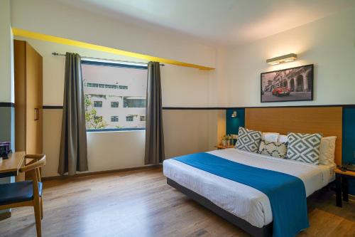 Olive Hotel Indiranagar by Embassy Groupにあるベッド