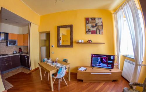 TV a/nebo společenská místnost v ubytování La casa di Bubi