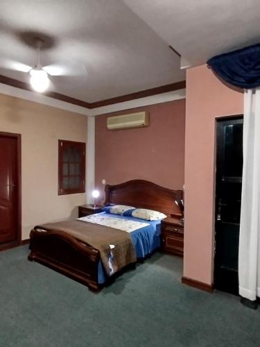 Ένα ή περισσότερα κρεβάτια σε δωμάτιο στο Hotel Perez