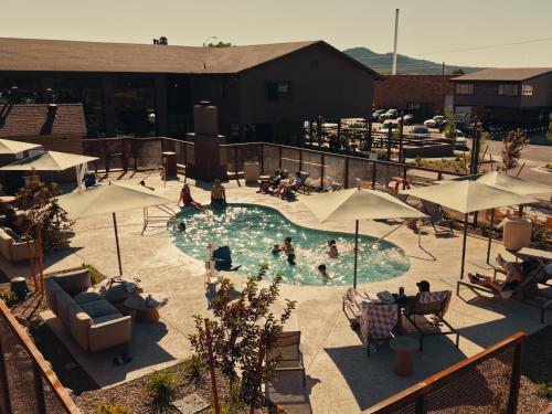 an overhead view of a swimming pool with people in it at Trailborn Grand Canyon, Outdoor Collection by Marriott Bonvoy in Williams