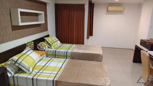 Katil atau katil-katil dalam bilik di Apartment Surabaya Timur