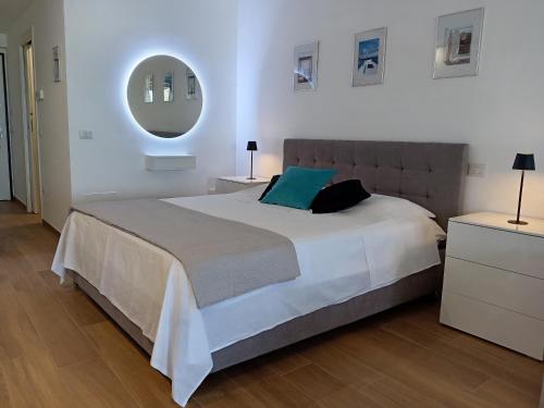 Katil atau katil-katil dalam bilik di SUITE CONTI 36 terrazza sul mare