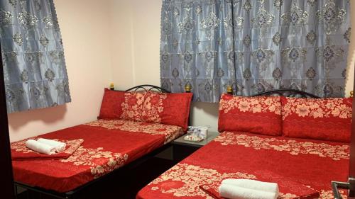 Postel nebo postele na pokoji v ubytování Manila Guest House