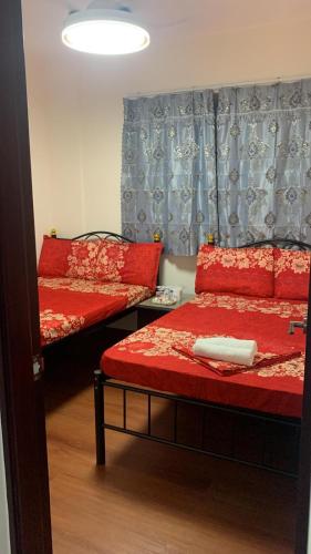 Postel nebo postele na pokoji v ubytování Manila Guest House