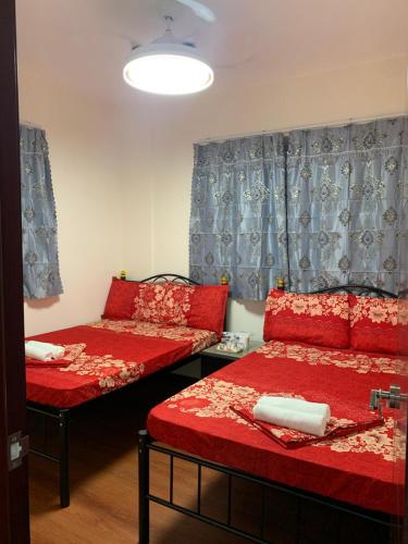 Postel nebo postele na pokoji v ubytování Manila Guest House