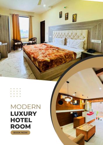 a hotel room with a large bed and a living room at Hotel tree inn in Zirakpur