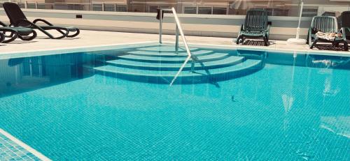 Πισίνα στο ή κοντά στο Villa's homes in Playa Arena