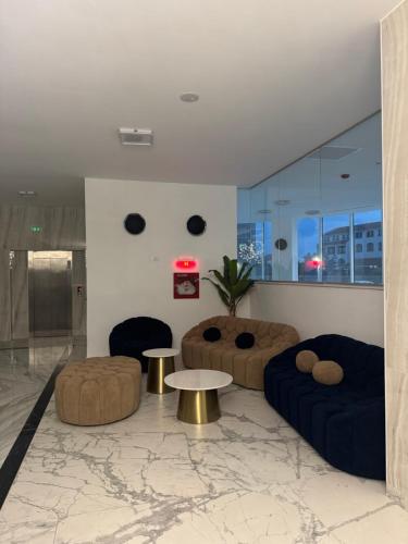 Ein Sitzbereich in der Unterkunft White Sea Studio Premium